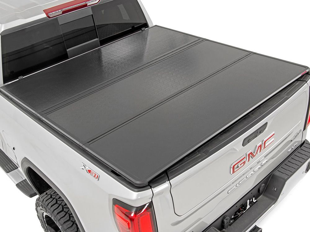 2014-2018 GMC Sierra 1500 (with 5' 6" bed) Hard Tri-Fold Tonneau Cover by Rough Country