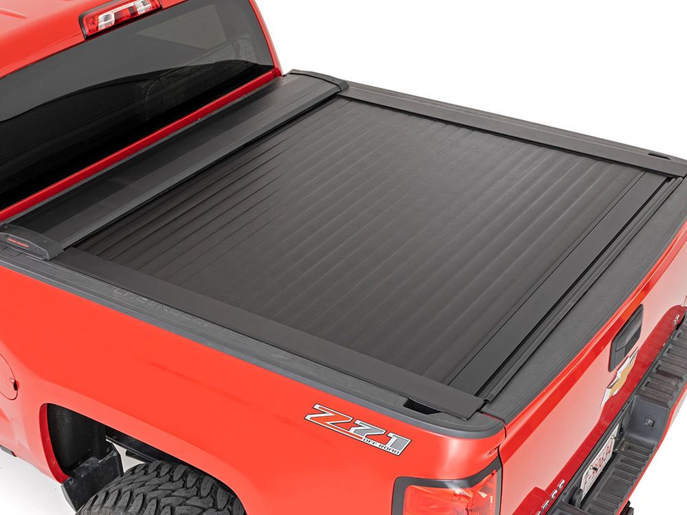 2004-2018 GMC Sierra 1500 (w/5' 7" bed) Retractable Tonneau Cover by Rough Country